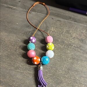 chunky‎ acrylic bubblegum bead necklace with a purple tassel